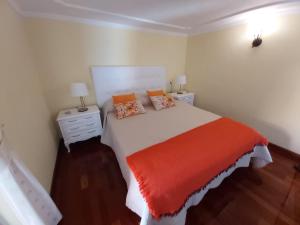 מיטה או מיטות בחדר ב-Camino Real