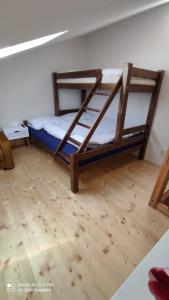 Postel nebo postele na pokoji v ubytování Domeček ve dvoře