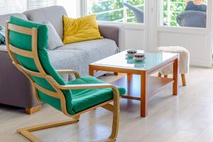 Ein Sitzbereich in der Unterkunft Apartment Seaside