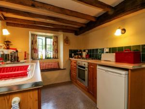 Kuchyň nebo kuchyňský kout v ubytování Bell Buoy Cottage + 4 fotografie