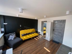 Posteľ alebo postele v izbe v ubytovaní Apartamenty Czapla