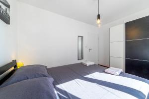 Ein Bett oder Betten in einem Zimmer der Unterkunft Apartment Seaside