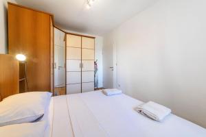 Ein Bett oder Betten in einem Zimmer der Unterkunft Apartment Seaside
