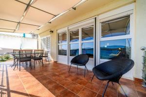 Ein Sitzbereich in der Unterkunft Apartment Seaside