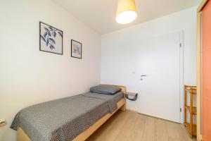 Ein Bett oder Betten in einem Zimmer der Unterkunft Apartment Seaside