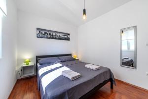 Ein Bett oder Betten in einem Zimmer der Unterkunft Apartment Seaside
