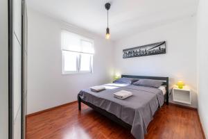 Ein Bett oder Betten in einem Zimmer der Unterkunft Apartment Seaside