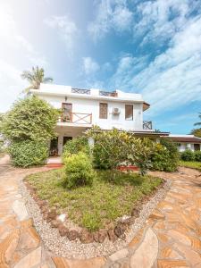 Afbeelding uit fotogalerij van Flame Tree Cottages in Nungwi