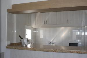 Kuchnia lub aneks kuchenny w obiekcie Apartamentos El Moro