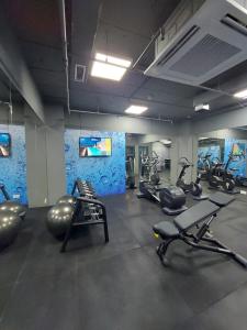 a gym with several exercise bikes in a room at The Embassy Valletta Hotel in Valletta