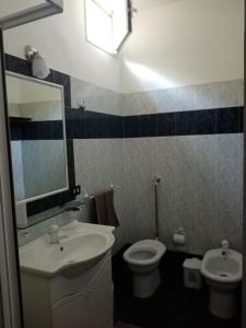 Vonios kambarys apgyvendinimo įstaigoje Vico Tirella