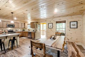 a large kitchen with a large table in a cabin at Misty Mountain Retreat in Sevierville