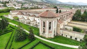 an aerial view of a large building with green grass at B&B NONNO MICHELE in Padula