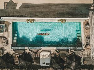 Bazén v ubytování Boutique Hotel EL NIDO Holbox nebo v jeho okolí