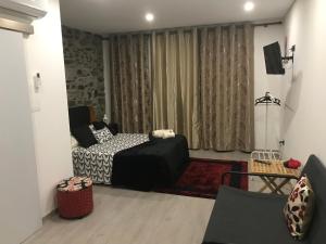 Un pat sau paturi într-o cameră la Alojamento Joaninha Douro 2
