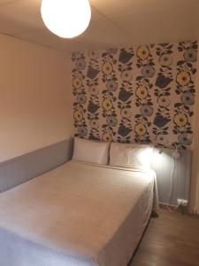 Postel nebo postele na pokoji v ubytování Hotel Chez Benat