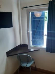 TV a/nebo společenská místnost v ubytování Hotel Chez Benat