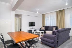 TV a/nebo společenská místnost v ubytování Kagan Holiday Apartments