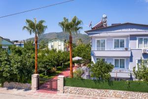 Photo de la galerie de l'établissement KAĞAN Holiday Apartments, à Kemer