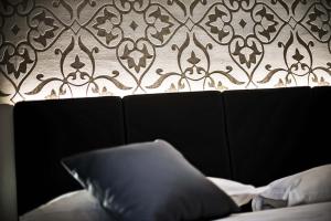 Posteľ alebo postele v izbe v ubytovaní Ilga Hotel