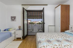 Postel nebo postele na pokoji v ubytování Apartments Istra Croatia
