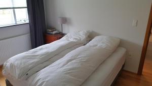 Uma cama ou camas num quarto em Vanny's Guesthouse