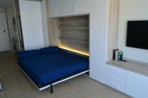 Postel nebo postele na pokoji v ubytování Apartamento El faro de Benidorm + 14 fotografií