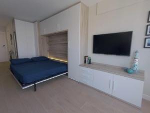 TV a/nebo společenská místnost v ubytování Apartamento El faro de Benidorm