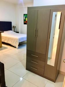 Postel nebo postele na pokoji v ubytování Suites Cervantes