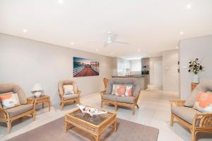 a living room with chairs and a table at Quarterdeck 20 in Lennox Head