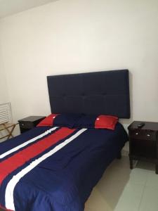 Postel nebo postele na pokoji v ubytování Suites Cervantes