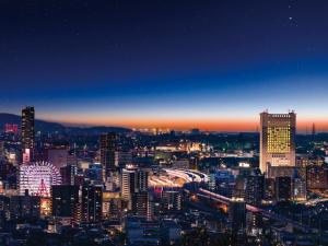 a view of a city at night at Rihga Royal Hotel Kokura Fukuoka in Kitakyushu