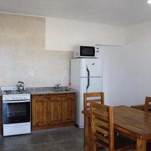 Una cocina o kitchenette en Calel Piren