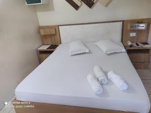 Postel nebo postele na pokoji v ubytování Hotel Belenzinho