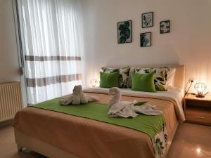 Posteľ alebo postele v izbe v ubytovaní Evris House oasis
