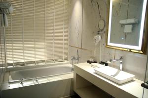 Vannituba majutusasutuses Udman Hotel Greater Noida