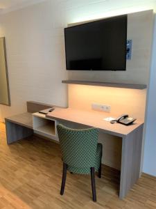 TV a/nebo společenská místnost v ubytování SeminarZentrum Rückersbach