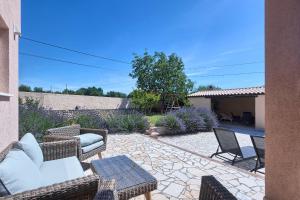 Patio alebo iná vonkajšia časť ubytovania Villa Pascal