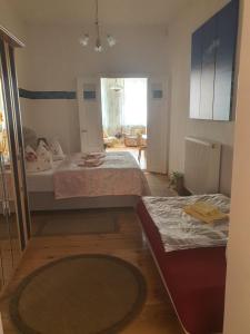 Postel nebo postele na pokoji v ubytování Große Ferienwohnung 85qm