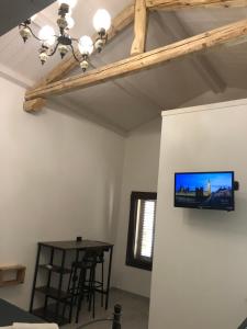 TV a/nebo společenská místnost v ubytování le mura