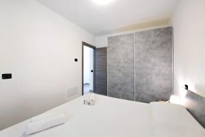 Кровать или кровати в номере Appartamento 4