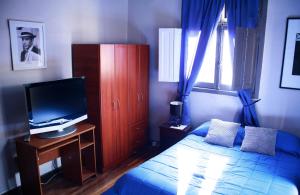 Cama ou camas em um quarto em Hostal Boonen