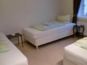 Ένα ή περισσότερα κρεβάτια σε δωμάτιο στο Guesthouse Tilraun