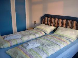Ένα ή περισσότερα κρεβάτια σε δωμάτιο στο Guesthouse Tilraun