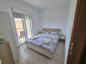 Posteľ alebo postele v izbe v ubytovaní Lucas2 Lux Flogita apartment