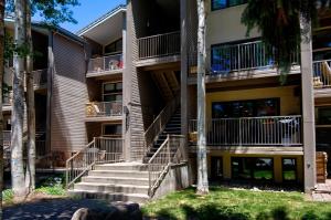 a building with stairs and trees in front of it at Beaver Creek West 14 in Avon