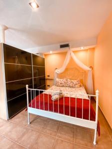 Postel nebo postele na pokoji v ubytování Apartamentos Turisticos Graus