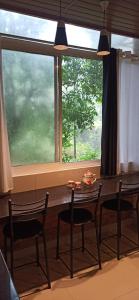 Posezení v ubytování Aruvi homestay