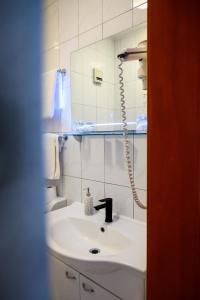 Koupelna v ubytování Hotel MB