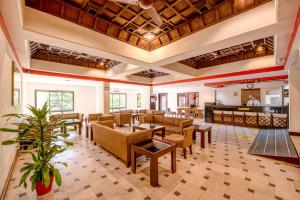 En restaurant eller et andet spisested på La-Paz Gardens Beacon Hotel - Vasco da Gama Goa